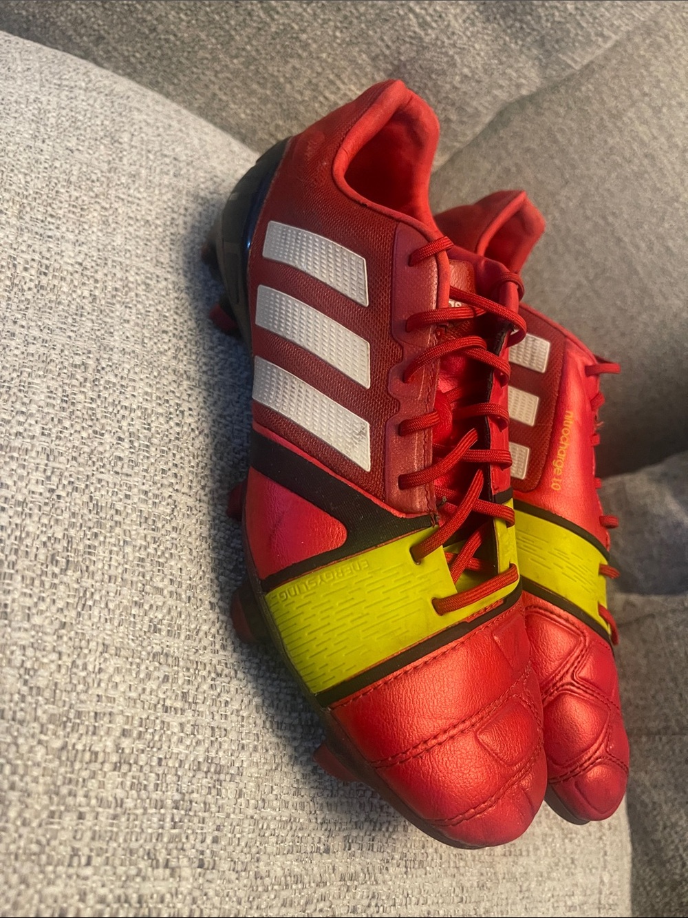 adidas Kids Red Soccer Cleats with Yellow Strap and White Stripes